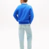 Barnesweater med bølget flagglogo