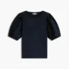 Broderte eyelets-top i blandet materiale