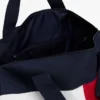 Dufflebag med fargeblokker og flagglogo