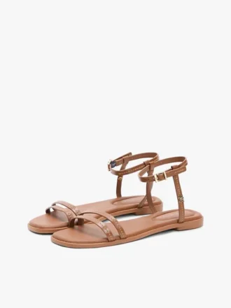 Flat skinnsandale
