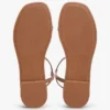 Flat skinnsandale