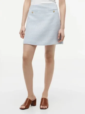 Mini-skjørt i tweed med gullknapper