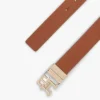 Monogram-spenne, vendbart skinnbelte