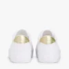 Sneakers i kanvas med metalliske detaljer