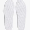 Sneakers i kanvas med metalliske detaljer