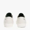 Sneakers i kanvas med preget logo