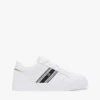 Sneakers med stroppestripe og skinnsåle