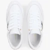 Sneakers med stroppestripe og skinnsåle