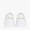 Sneakers med stroppestripe og skinnsåle