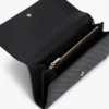Stor lommebok med monogram over hele overflaten
