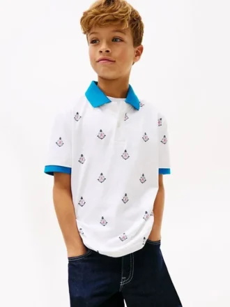 Stretch-polo med nautisk logo over hele for barn