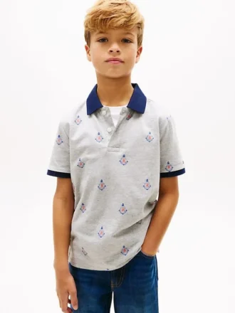 Stretch-polo med nautisk logo over hele for barn