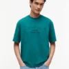 Tommy Jeans T-skjorte med slitt logo