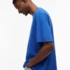 Tommy Jeans T-skjorte med slitt logo
