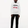 Tommy x Cadillac F1® Team Chevron-hettegenser for barn