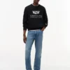 Tommy x Cadillac F1® Team Logo-genser