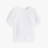 Top med puffermmer og broderte hull