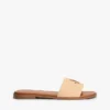 Vevde sandaler med monogram